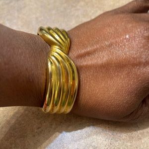 Gold tone cuff bracelet used
